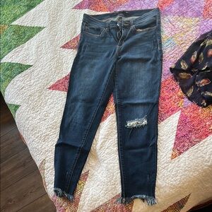 Women's Distressed Blue Jeans